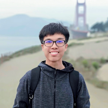 Smiling Henry with his dark gray parka at Golden Gate Overlook, San Francisco.