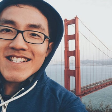 A head shot of Sheng Han Lim with Golden Gate Bridge in the background.